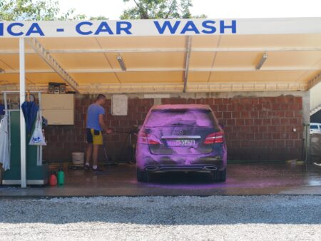 Washing a rental car before delivery